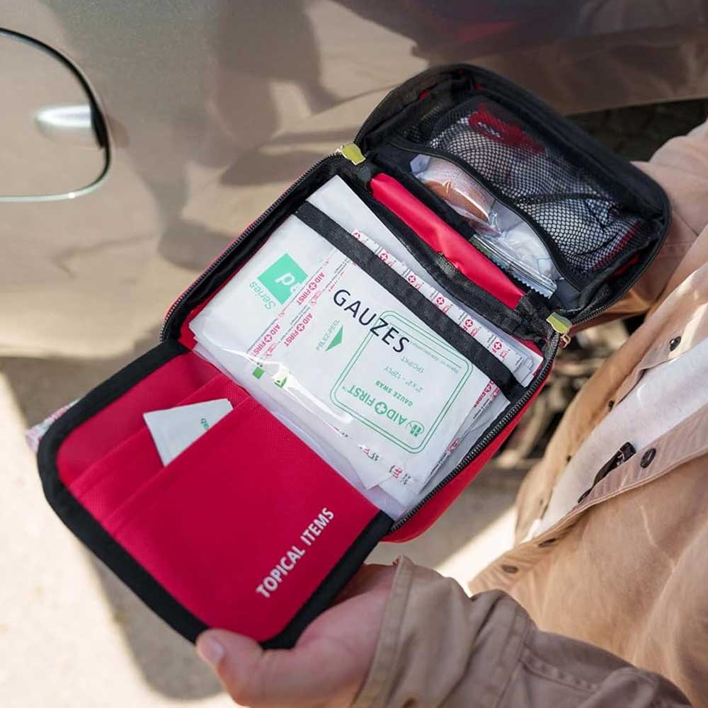 First Aid Kit - Compact Emergency Medical Kit with Bandages, Gauze, and More