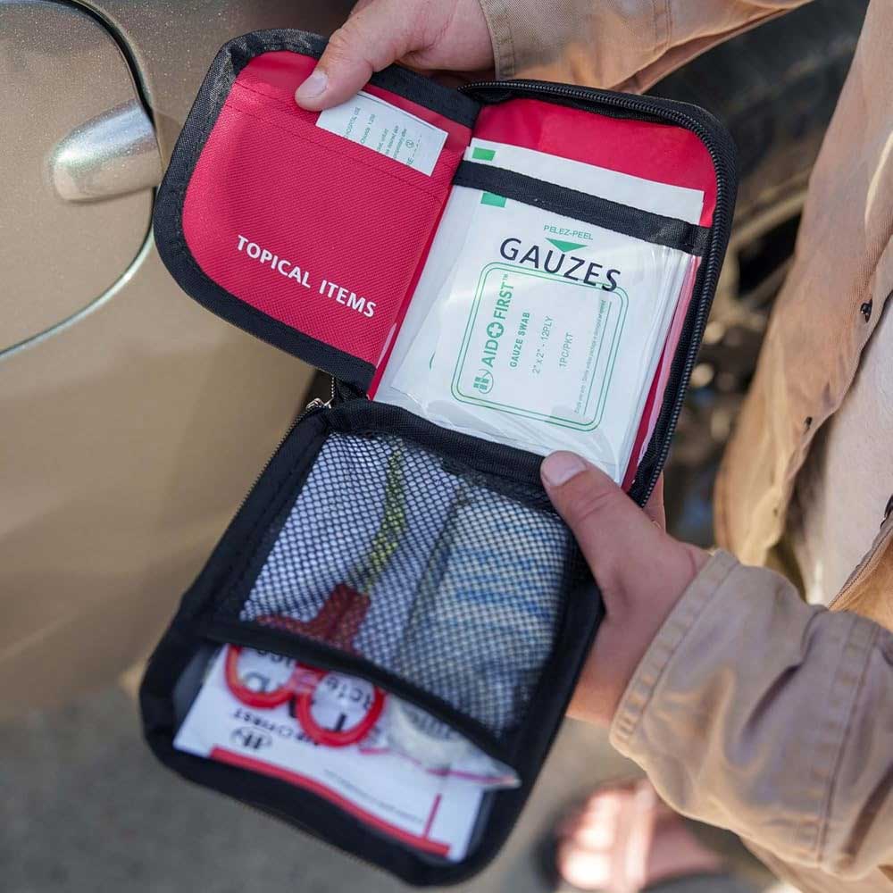 First Aid Kit - Compact Emergency Medical Kit with Bandages, Gauze, and More